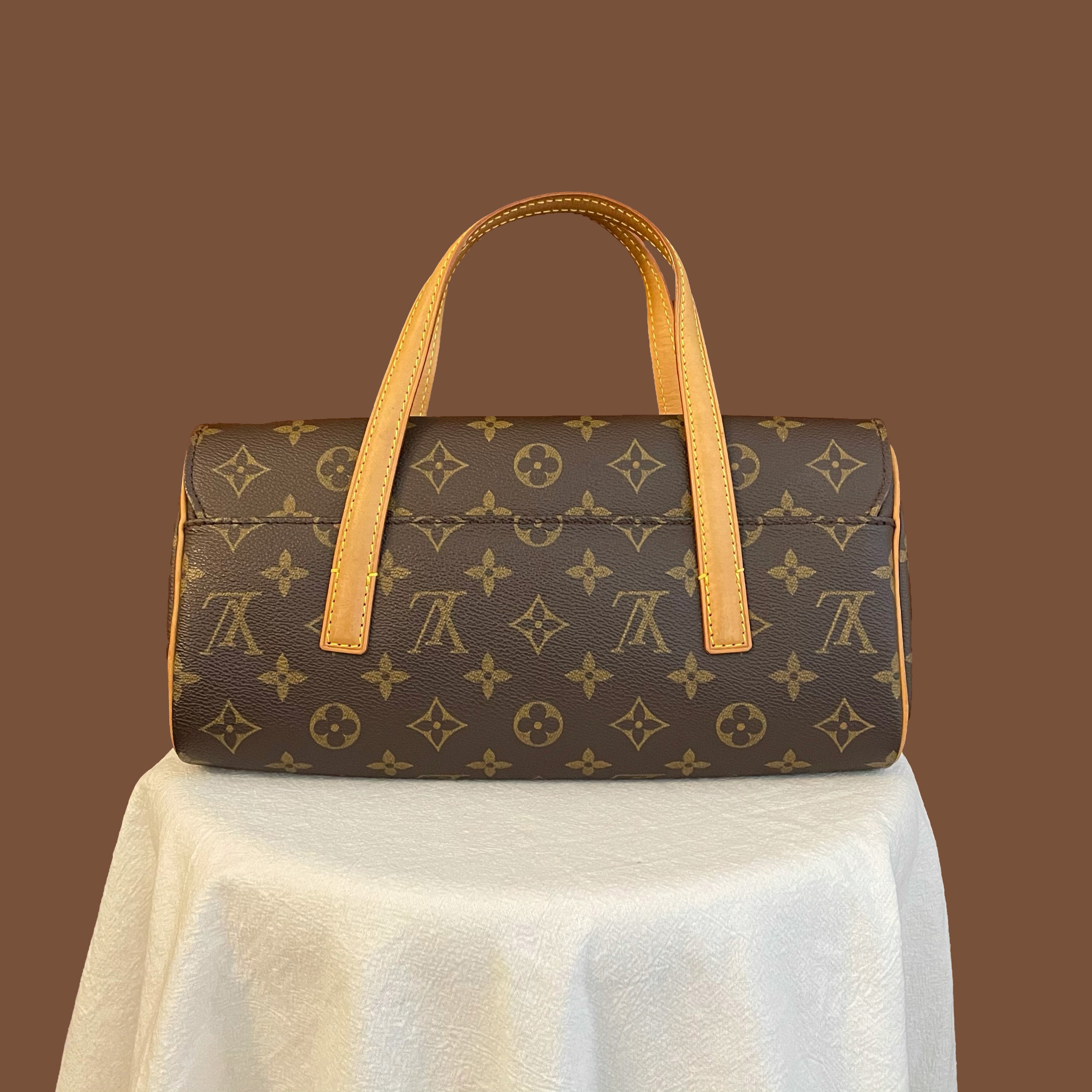 Sonatine fabric handbag Louis Vuitton Brown in Cloth - 35371800